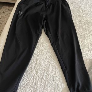 3 Lightly worn XL under armor joggers.. 1 black 2 grey